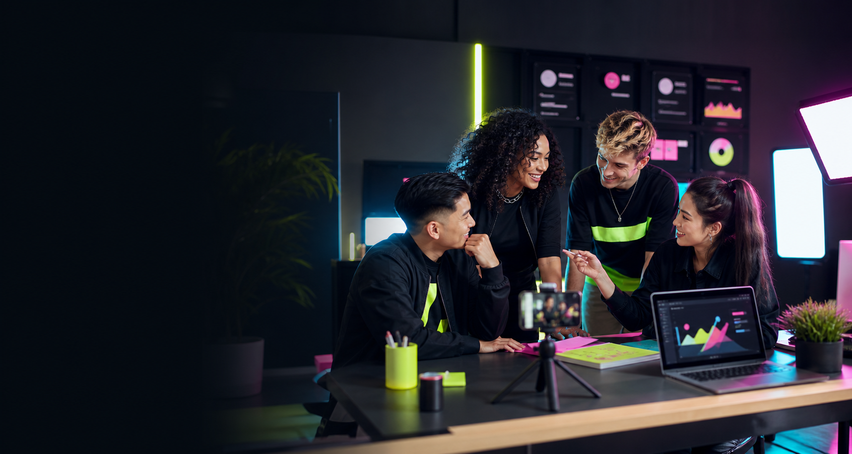 Creators and an agency strategist collaborating in a modern content studio
